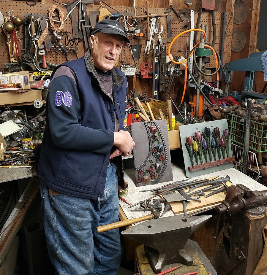 Dr. Bruce Jarrell said that being a surgeon and a blacksmith both require the same technical skills. He works on metal at his Severna Park home.