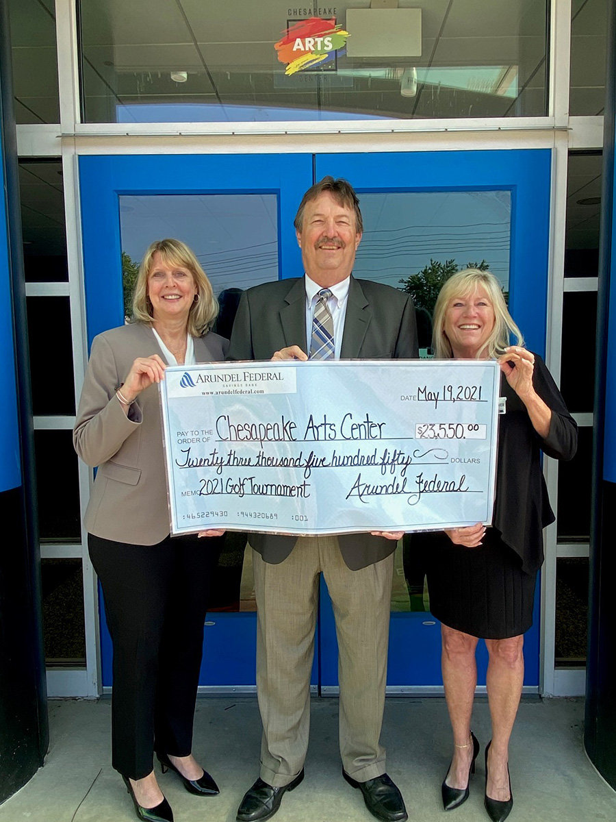 On behalf of Arundel Federal Savings Bank, Tom Herpel (center) presented a $23,550 check to Chesapeake Arts Center’s executive director Donna Anderson (left) and board member Brenda Fraley Garver.