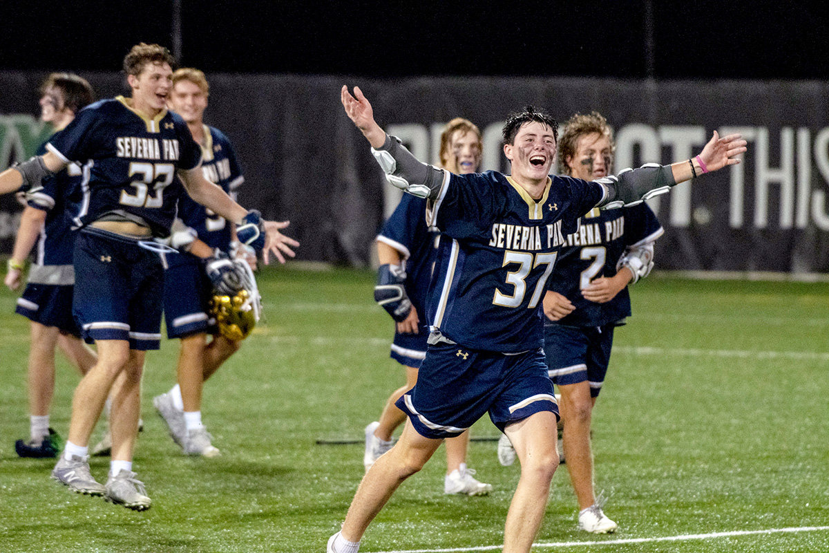Parker Sealey (37) and his teammates were euphoric after the win.