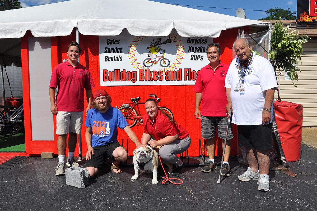 The Bulldog Schwinn & Sports staff, led by Mike Prager (far right) and his daughter Brittany (center) is big on white-glove service.