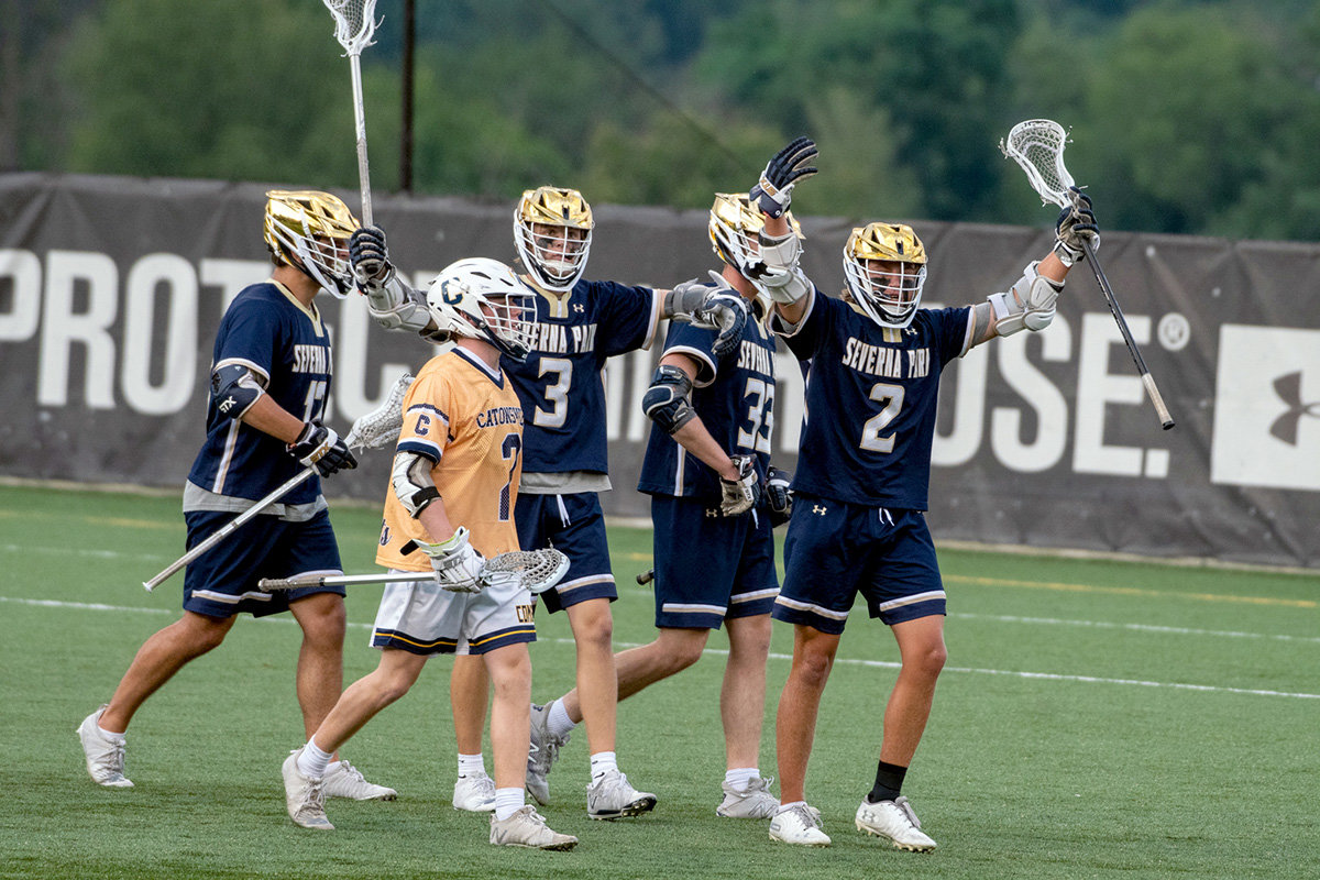 The Falcons celebrated after scoring a goal in the first quarter of the 4A state championship against Catonsville on June 19.