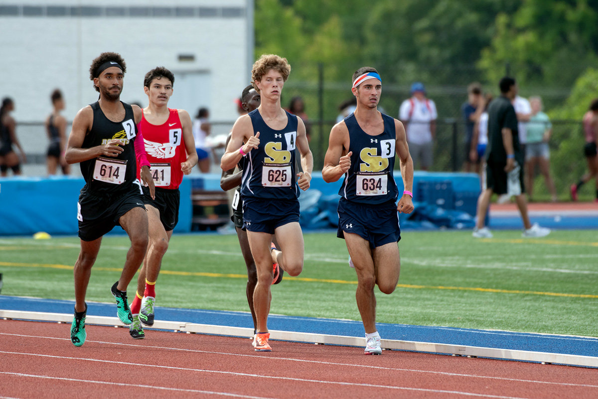 Tyler Canady (second from right) and Carson Sloat (right) were two of the top four finishers in the 1600-meter run.
