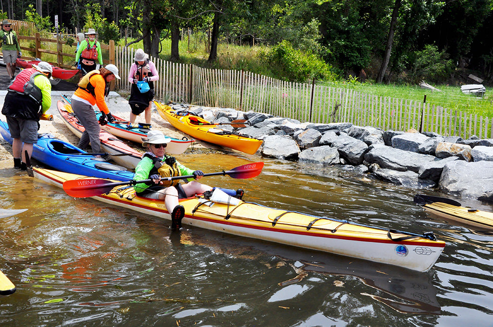 A group of kayakers used the Solley Cove beach launch area following the ceremony on July 15.