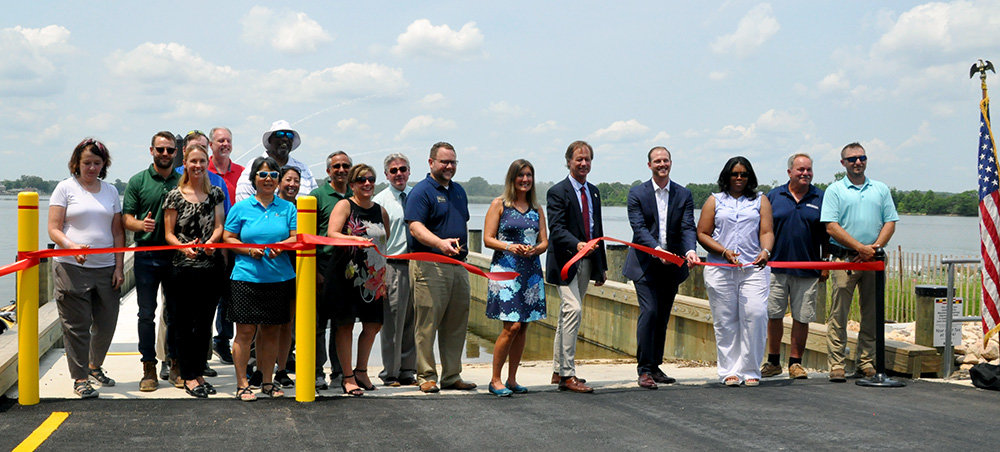 Anne Arundel County Recreation and Parks employees, Public Works staff members, and elected officials cut the ribbon at Solley Cove Park in Curtis Bay on July 15.