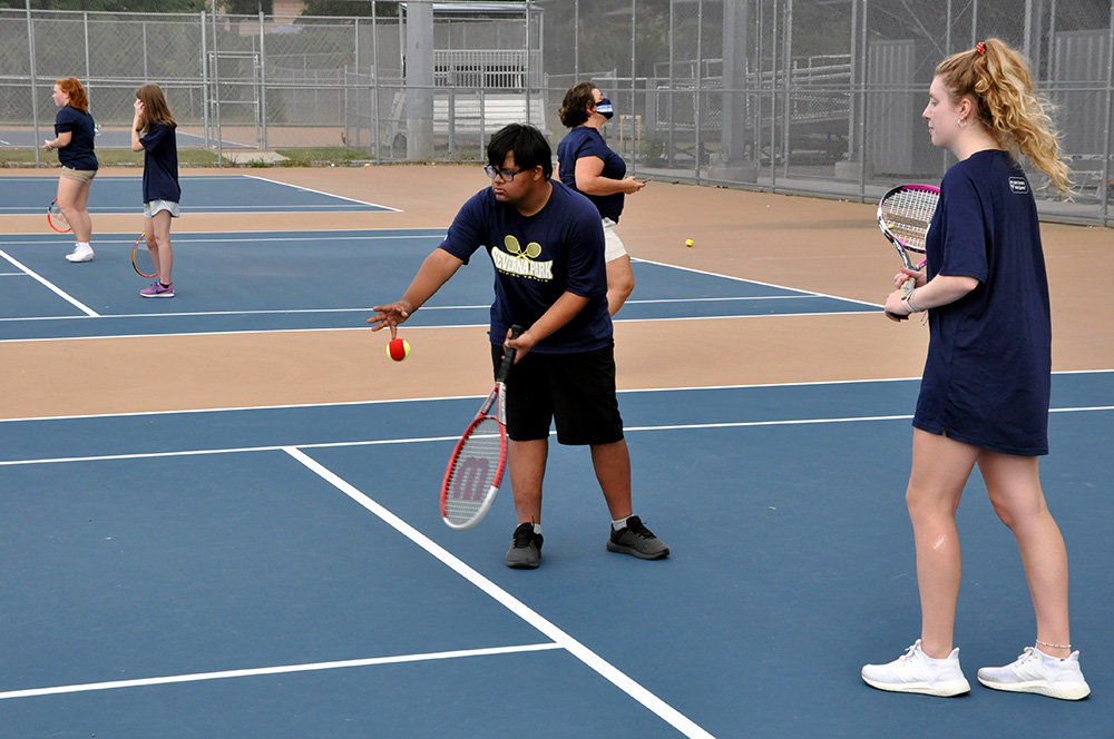 Ty Kola (left) and teammate Brook Smith competed in a doubles match on September 21.