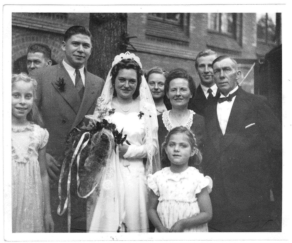 Inge and Bob Chisholm are pictured after their wedding in Germany with family members.