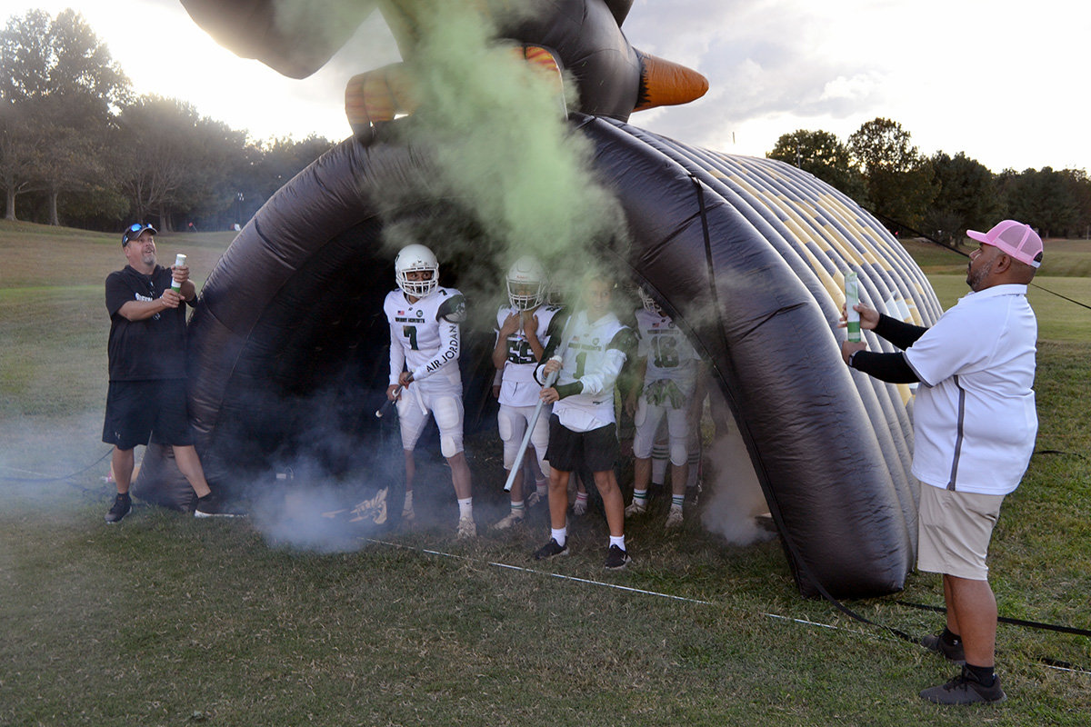 The Green Hornets 14U A team got ready to run out of the tunnel before their homecoming game vs. the Upper Queen Anne’s Lions on October 23.