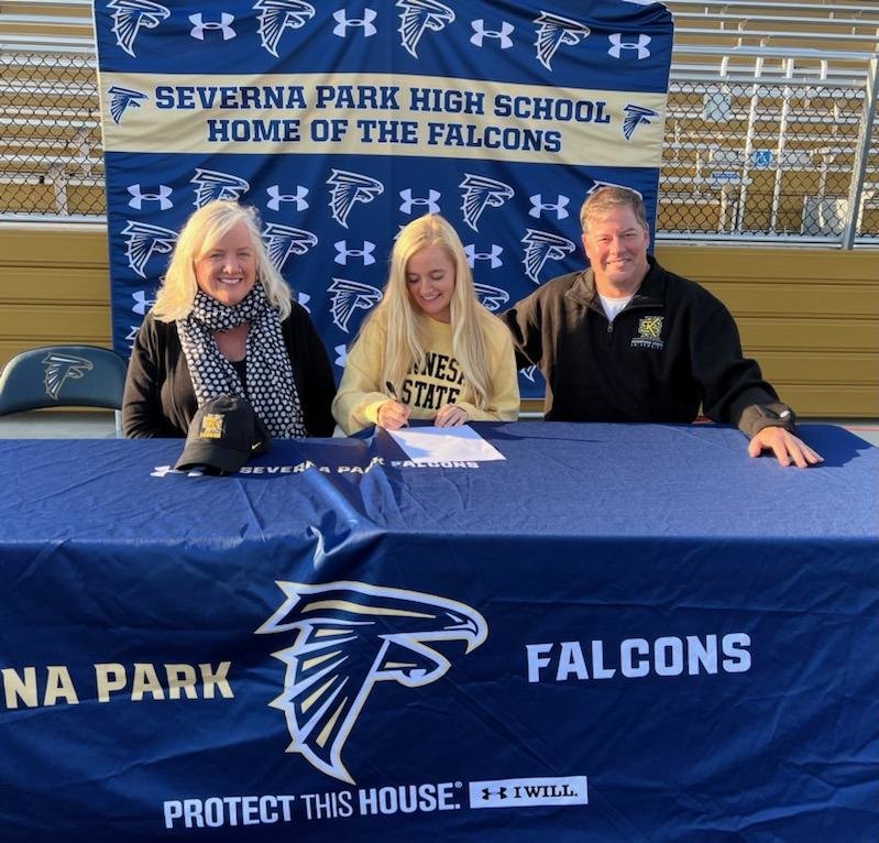 Flynn Prengaman (center) was joined by Rich and Colleen as she signed her letter of intent for Kennesaw State University.