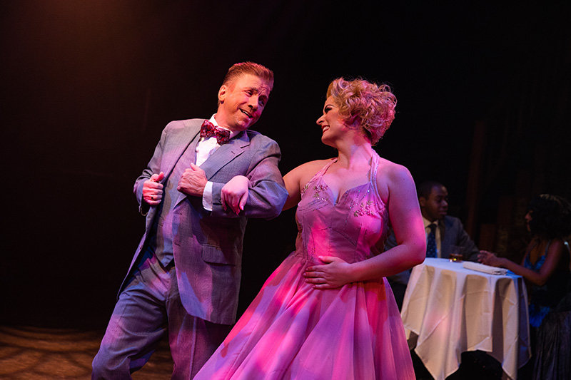 Phil and Judy (played by David James and Alicia Osborn, respectively) sing “The Best Things...” during “White Christmas” at Toby’s Dinner Theatre.
