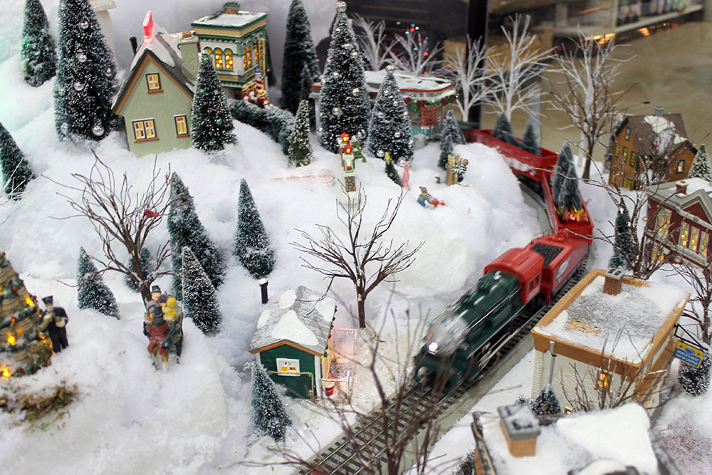 The train display at Homestead Gardens in Severna Park includes a single track, snow, trees and recognizable landmarks.