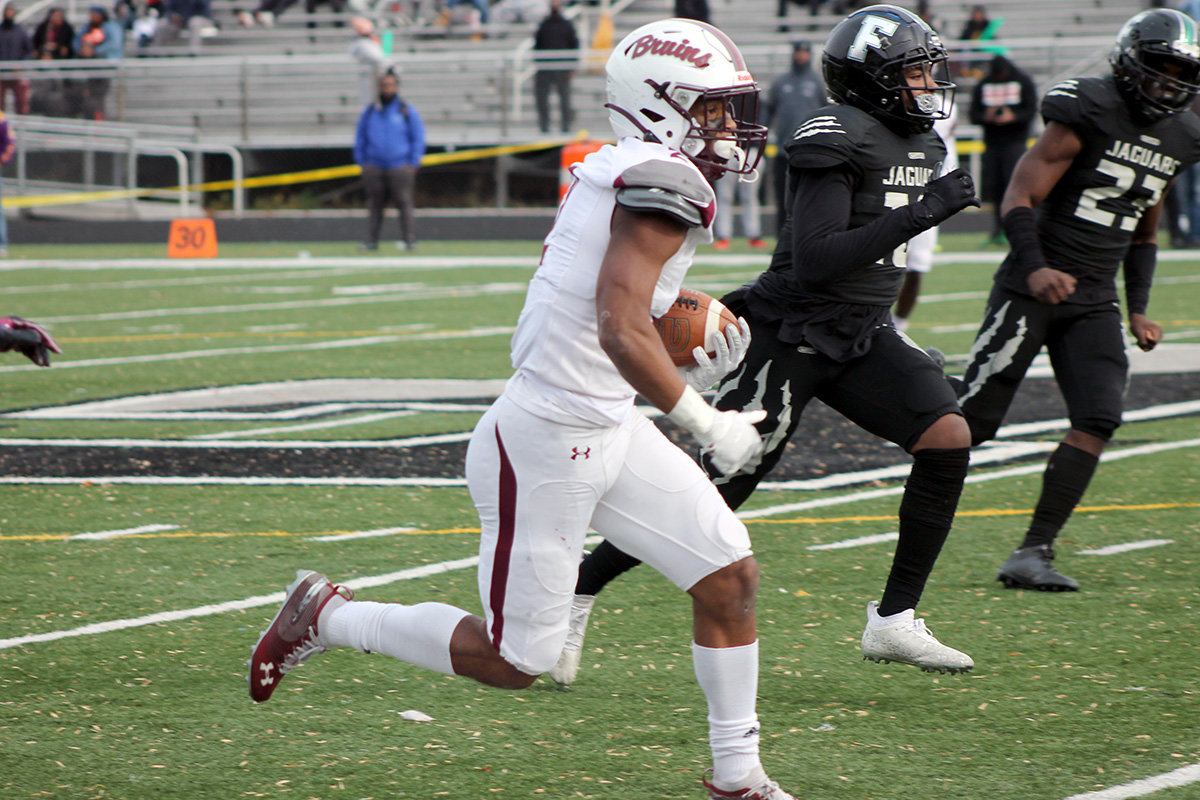 Broadneck's Davion White rushed for a 55-yard touchdown against Charles Herbert Flowers High School in the state quarterfinals.