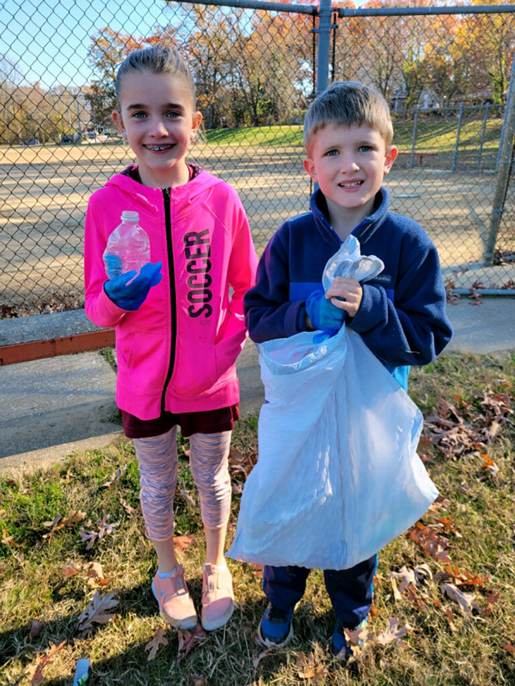 Ali and Ben Carlin (third and first grade, respectively) collected trash at Severna Park Middle School.