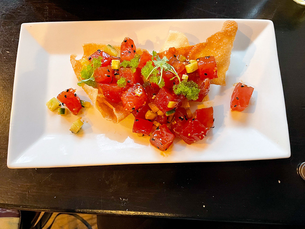 Level's tuna tartare — served with cucumber, spicy soy vinaigrette, wasabi tobiko and giant crispy wontons — was perfectly spiced.