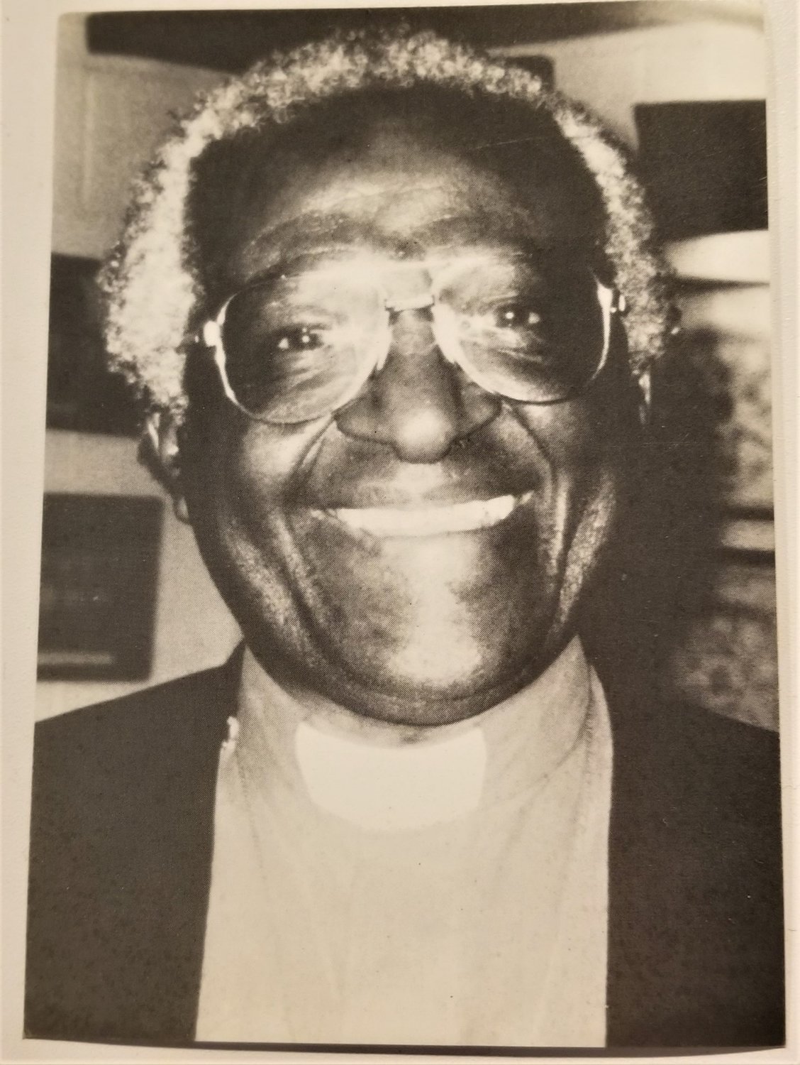 Heather Bobbitt has kept this postcard picture of Desmond Tutu taped in her kitchen every day since 1999. “His wonderful smile making me smile all the years since,” she said.