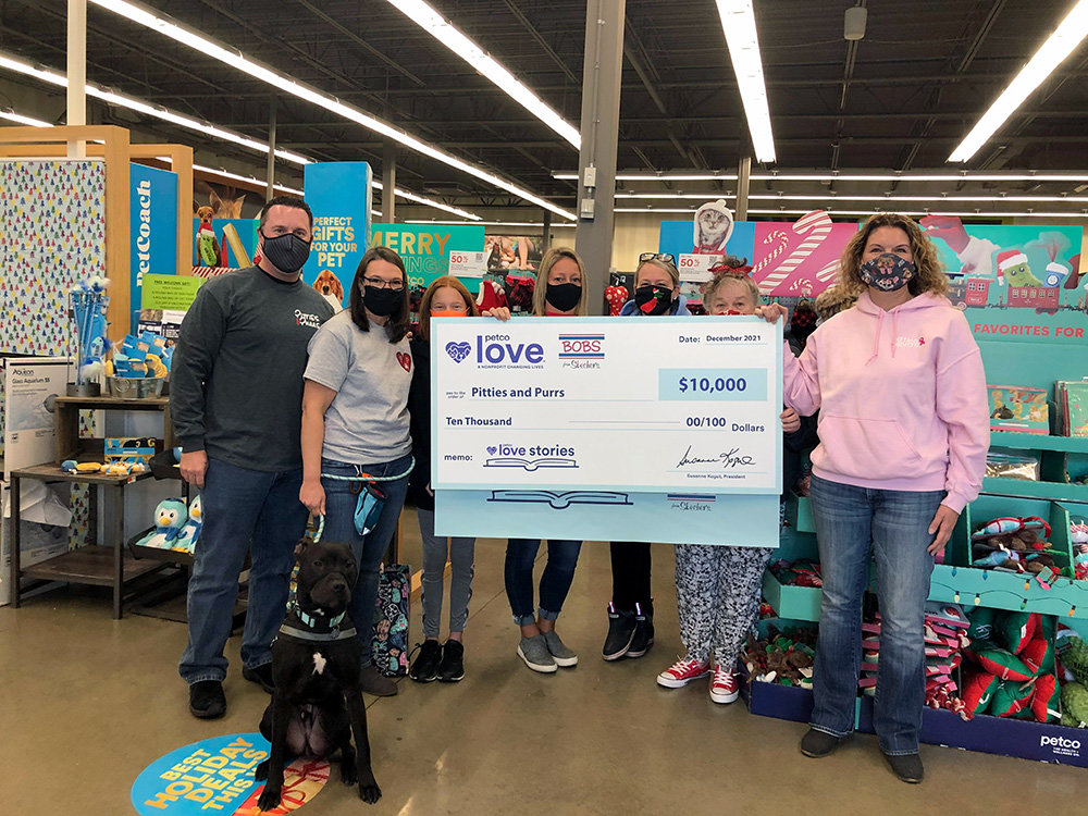 (L-R) Rob Newman, Julie Newman and Cara Newman were proud to present a check to Kim Defelice (executive director of Pitties and Purrs), Erica Aburn (events coordinator at Pitties and Purrs), Mary Sullivan (president of Pitties and Purrs) and Toni Vale (vice president of Pitties and Purrs).