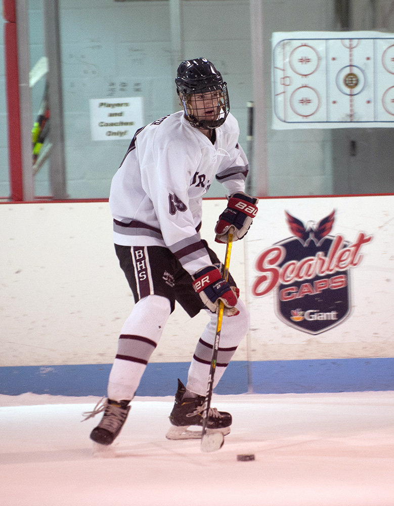 Beau Porter looked to pass the puck to a teammate during the third period of Broadneck’s 5-4 loss to Severna Park.