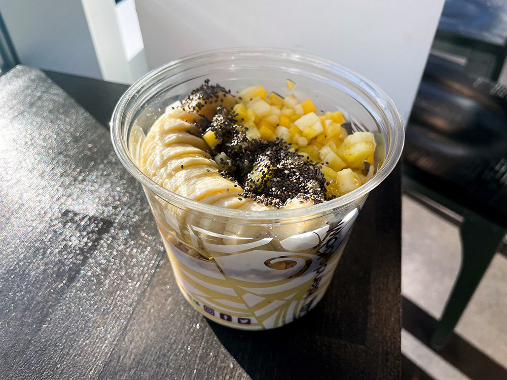 The passion fruit bowl, with a blended passion fruit base topped with bananas and mangos, tasted like sunshine.