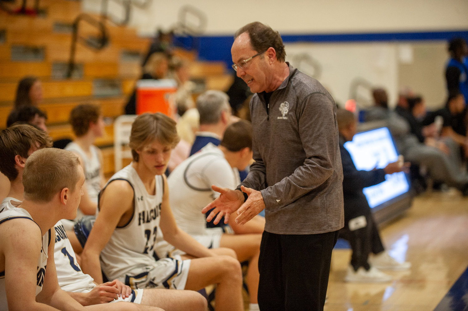 Severna Park boys basketball head coach Paul Pellicani discussed strategy with his team during the second half of his team’s win over Leonardtown.