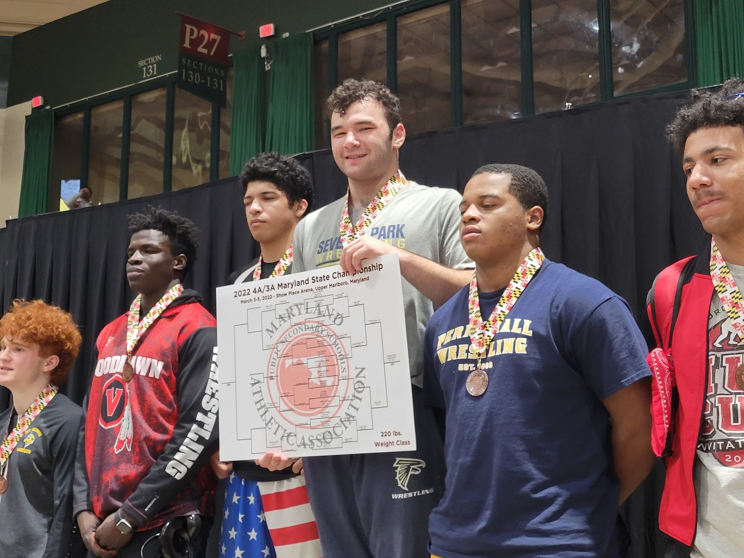 Patrick Ellis (center) Ellis won the Class 3A/4A state wrestling title for the 220-pound class, beating a previously undefeated wrestler, South River’s Lonnell Owens-Pabon.
