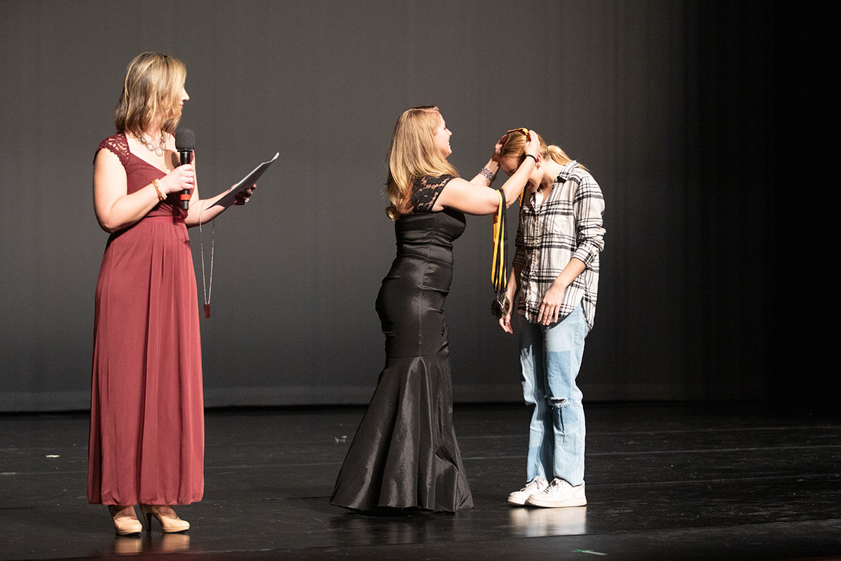 Faith Kiger received her medal during a gala in March.