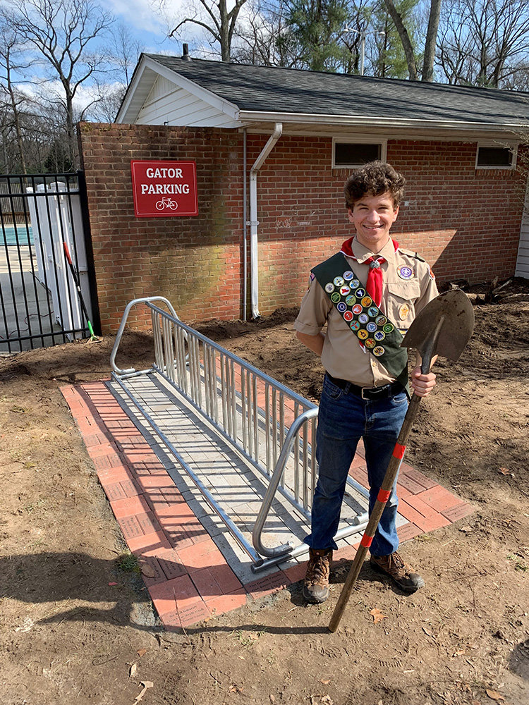 Kenny Coleman’s Eagle Scout project consisted of a bike rack, brick patio underneath and a parking sign.