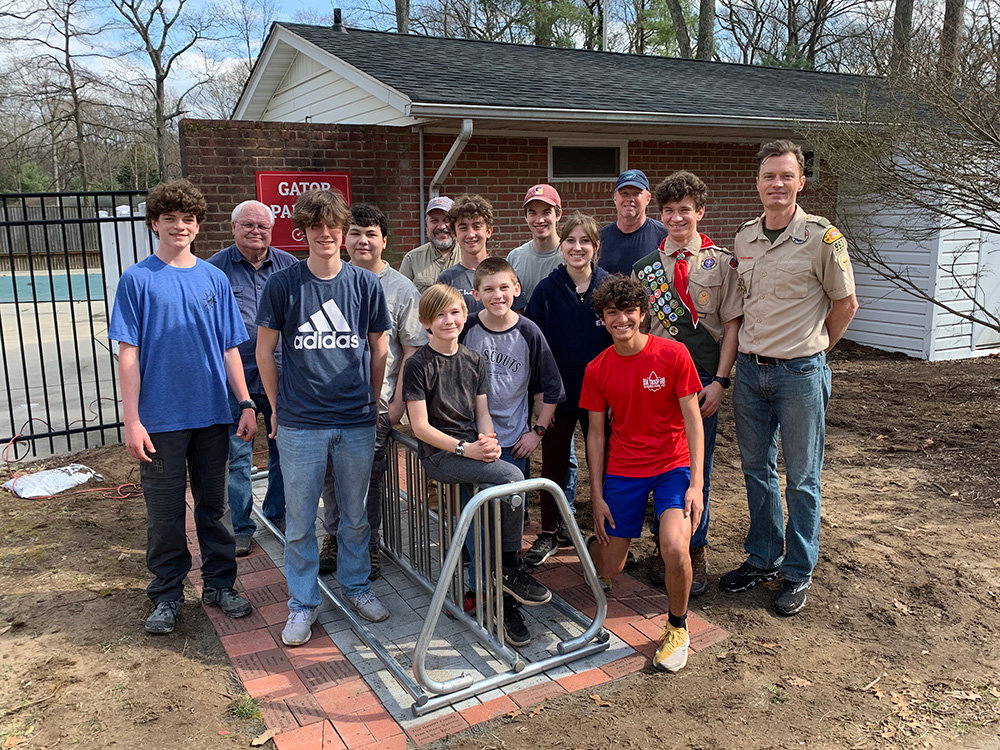 Scouts and scoutmasters from Troop 993 gathered after completing their project in March. Kenny Coleman and his father, Steve, are pictured on the far right.