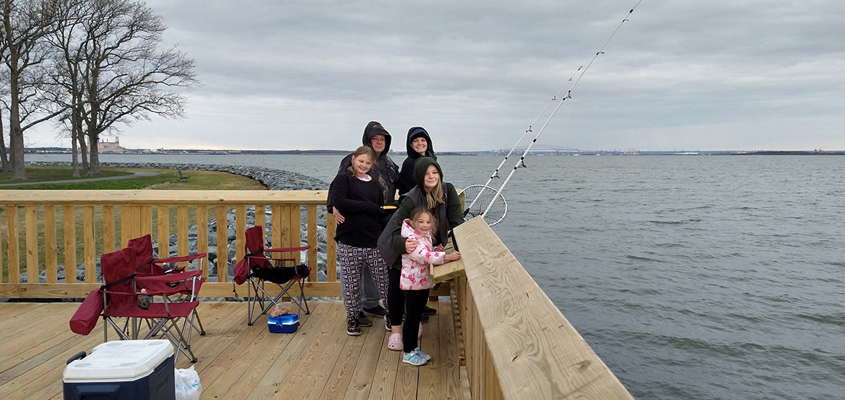 Melissa and Chad Koontz, and daughters Shaina, Chloe and Lilly, enjoyed a brisk Sunday morning while fishing from one of Fort Smallwood Park's three new fishing platforms on April 10.