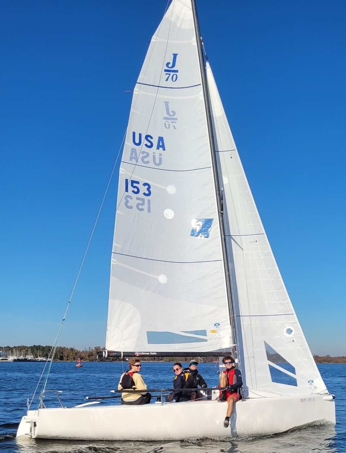 Will Harding of The Gilded Lady is pictured with Broadneck sailing team members Jonathan Weed, Anabel Chambers and Aden Keithley on a J70 at nationals in Florida.