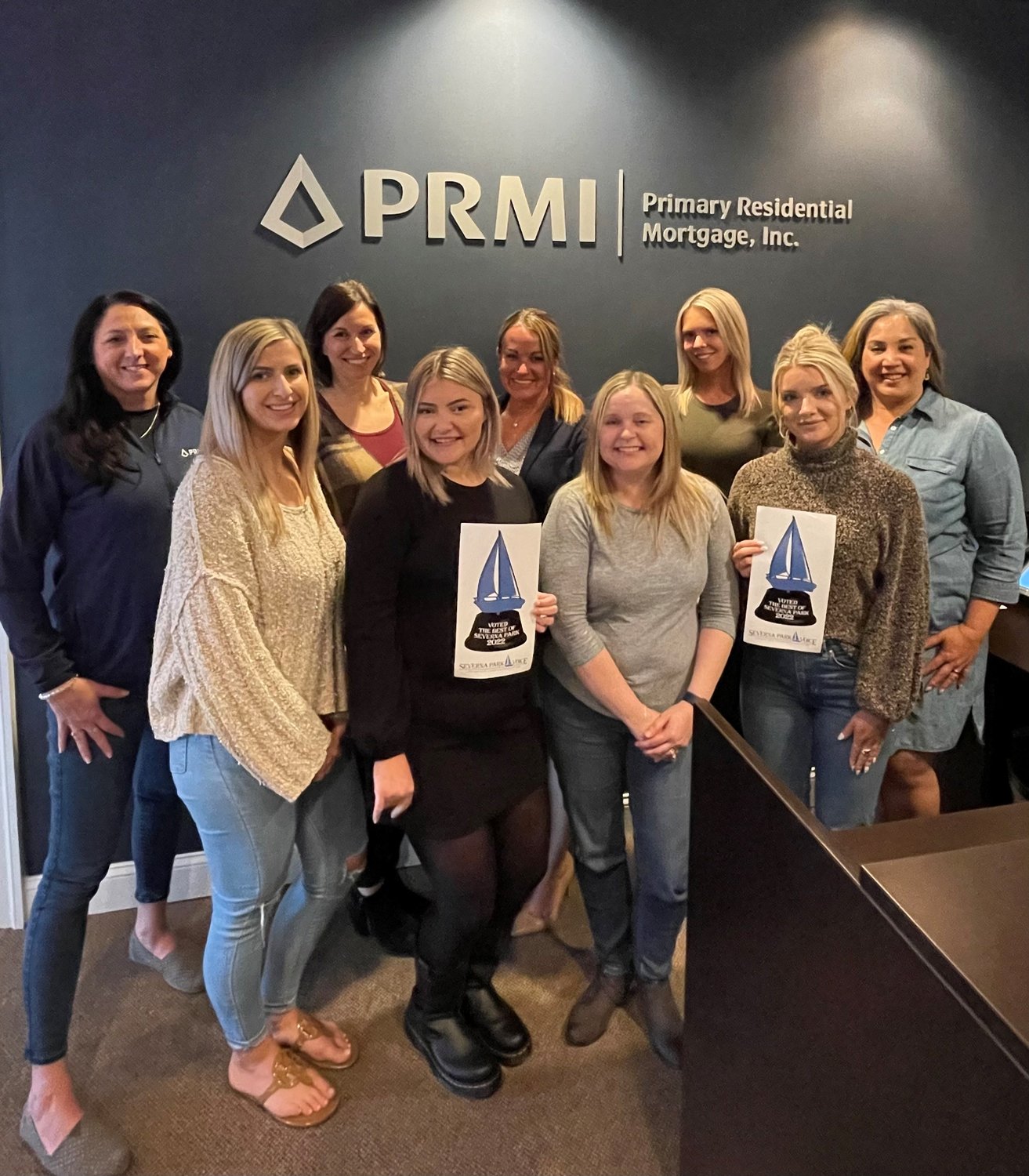 The Primary Residential Mortgage Inc. (PRMI) team, led by Kyndle Quinones, proudly accepted the award for Best Mortgage Company.