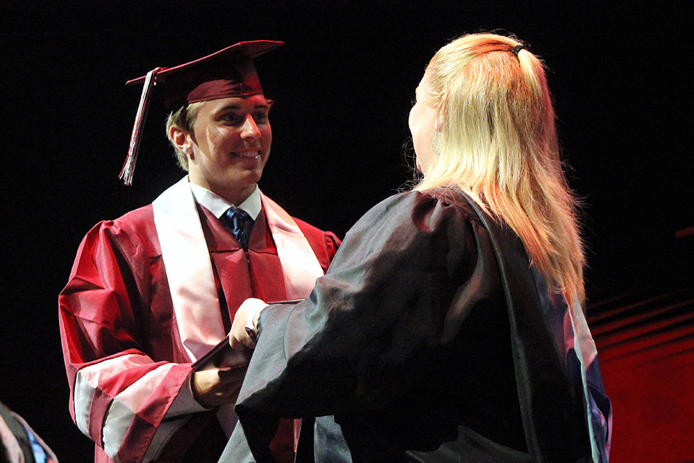 Josh Ehrlich walked across the stage to receive his diploma.