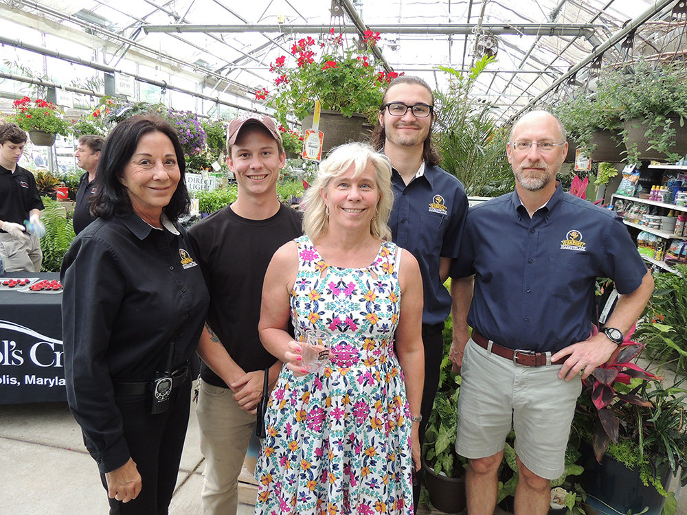 Fishpaws Marketplace owner Kim Lawson (center) is partnering with Homestead Gardens again this year to support the Baltimore Washington Medical Center Foundation.