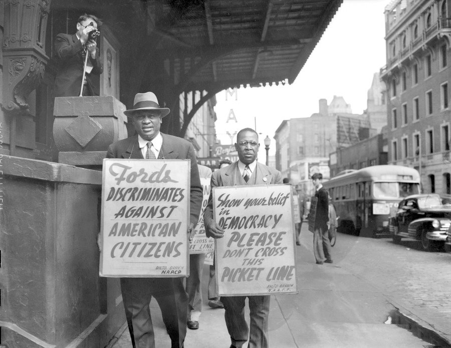This 1948 photograph by Paul Henderso shows Paul Robeson and Dr. John Camper protesting Ford's Theatre Jim Crow admission policy.