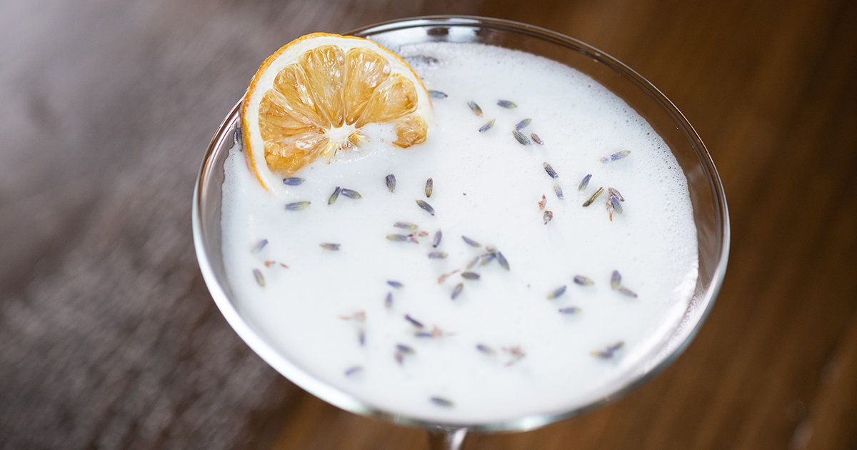 The Lavender Field mixes Monkey 47 Gin, lemon juice, honey syrup, and egg white for a slightly sweet, slightly citrusy finish.