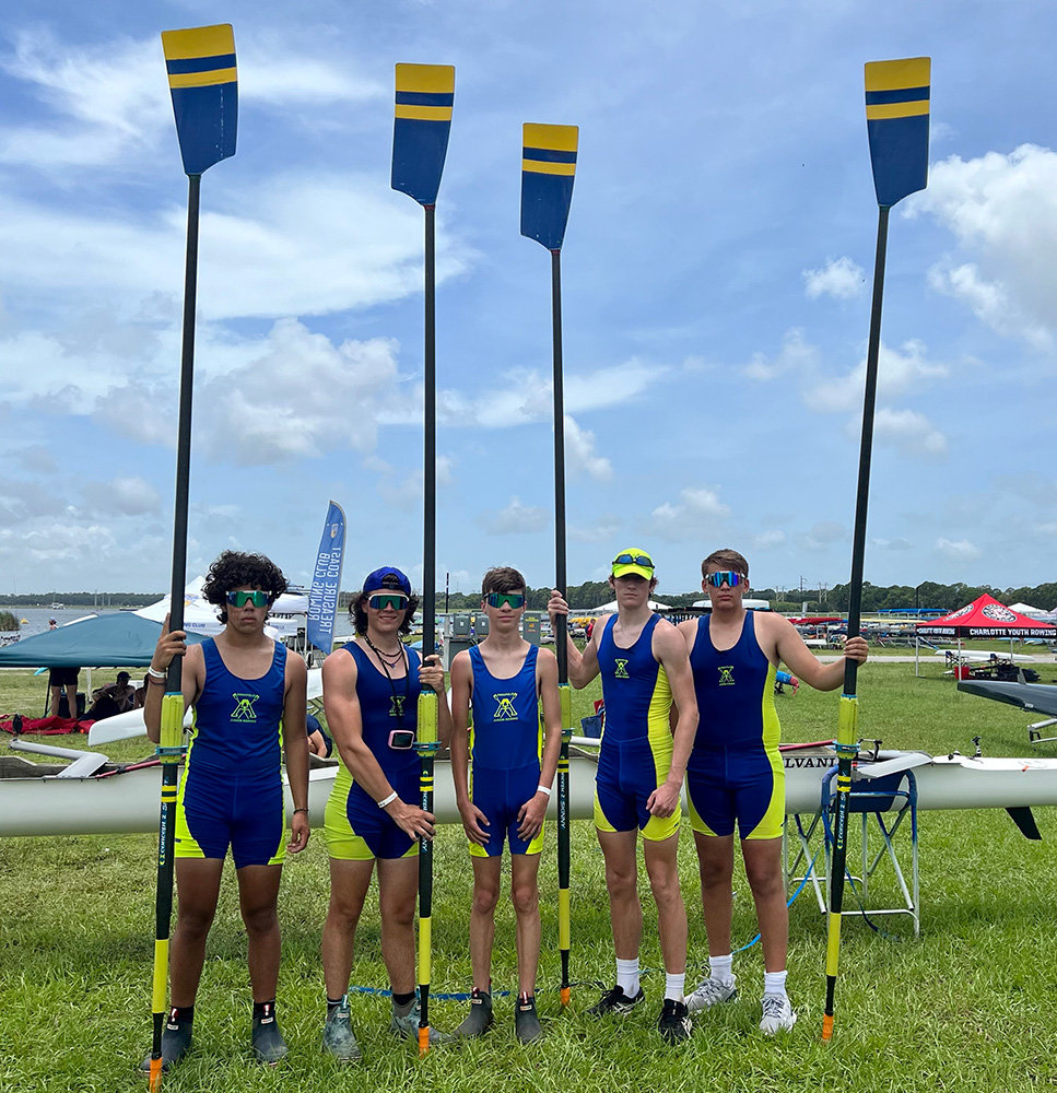 The team included (l-r) Ethan Cabucana and Santi Singolani of Severna Park High School, coxswain Hunter Labandeira of South River, and Lex Lauer and Max Henceroth of Broadneck High School.