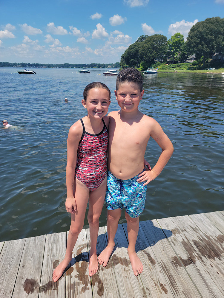 Twelve-year-old Mari Matthews (left) and her 10-year-old brother, Charlie Matthews, competed at the Severn River Swim Club’s Round Bay River League swim meet.