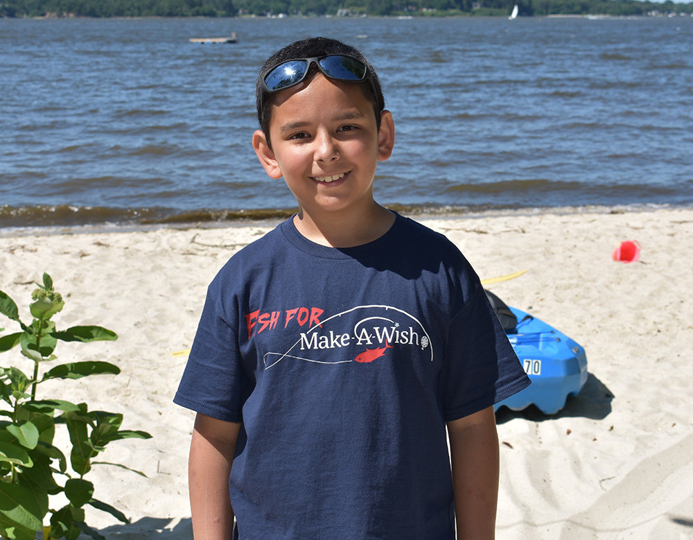 Magothy River Middle School student Eli Pereira created the Fish for a Wish tournament to honor his third-grade teacher who died of cancer.