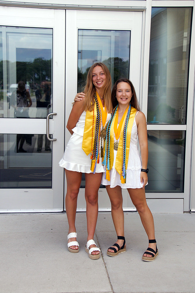 Salutatorian Neela Baker (left) and valedictorian Nicole Baker have used friendly competition to motivate each other.