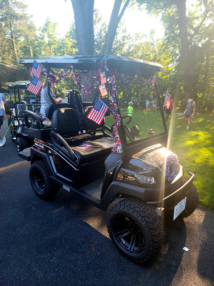 This decorated golf cart was part of Linstead's train float.