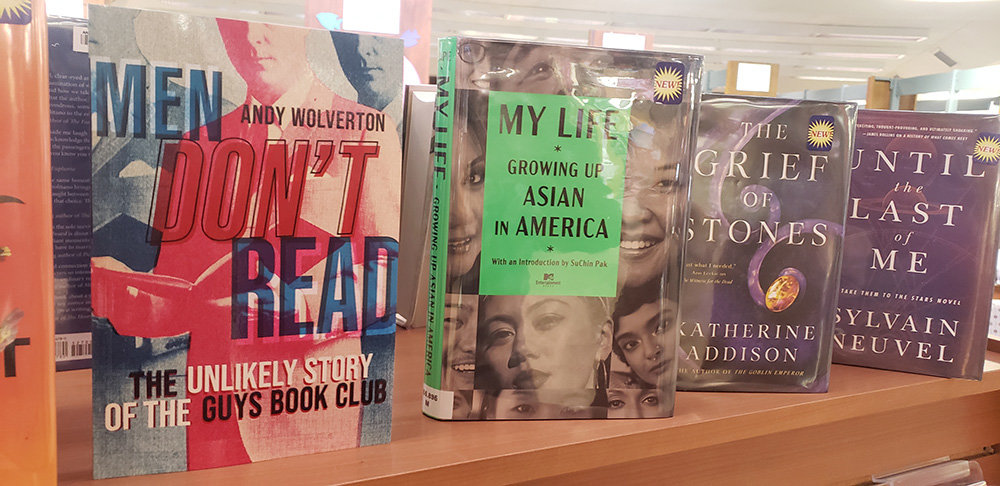 "Men Don't Read: The Unlikely Story of the Guys Book Club," by Severna Park librarian Andy Wolverton, sits among the library's offerings.