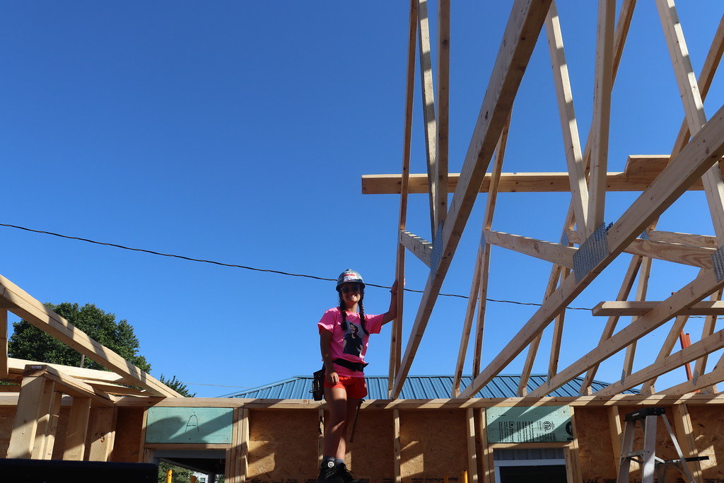 Olivia Blake, who will serve as youth chair for the next WoodsWork, has found her calling on the roof.