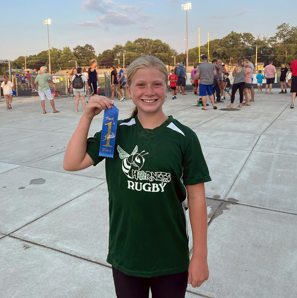 Waverly Alexander was awarded a ribbon for her performance in a girls 11-12 400-meter competition on July 15.