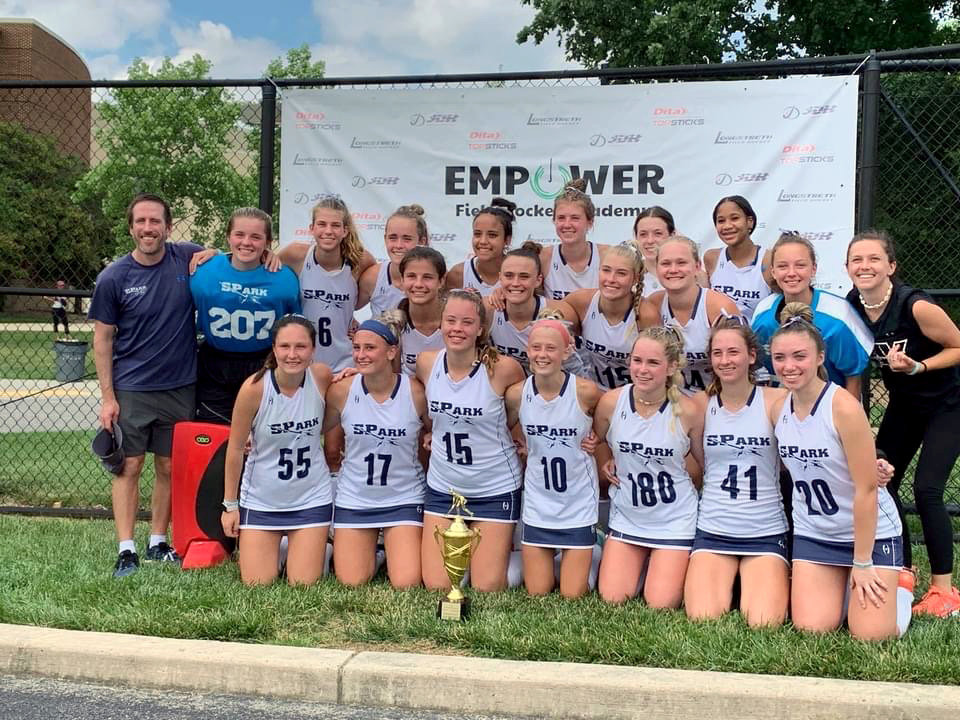 The SPark U16 team won first place at the regional club championships this spring. Jesse Larson (far left) and Mikayla Borneman (far right) served as coaches.