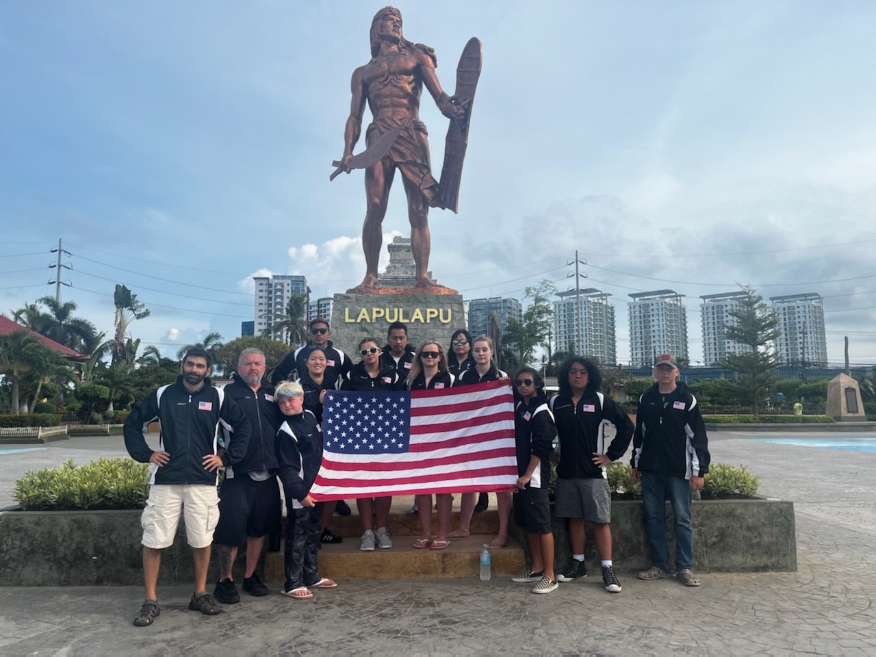 Team USA posed for photos in front of a shrine dedicated to Lapu-Lapu, a folk hero in the Philippines.
