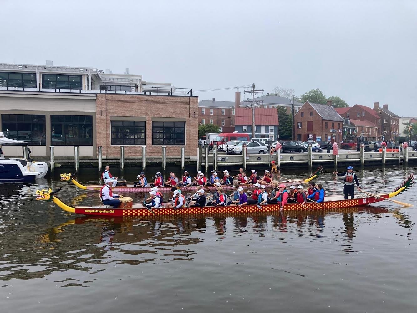 Members of the Annapolis Dragon Boat Club posed after their successful attempt in 2017 at a Guinness World Record by paddling a half marathon in under three hours in Spa Creek.