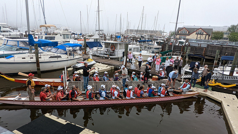 Members of the Annapolis Dragon Boat Club, along with Annapolis Mayor Gavin Buckley and Chris McLeary, owner of Pier 4 Marina, participated in the traditional "opening of the eye" ceremony to start the 2022 dragon boat season.