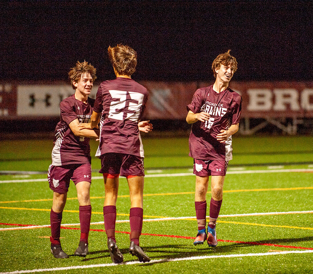 The Bruins celebrated after Harlan Welsh scored his second goal of the game just before halftime.