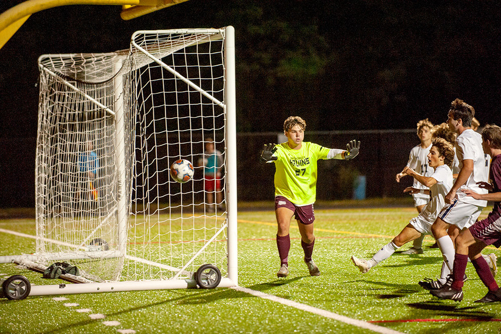 Matt Tettemer had seven saves for Broadneck. On this play, he watched the Falcons’ shot go wide left.