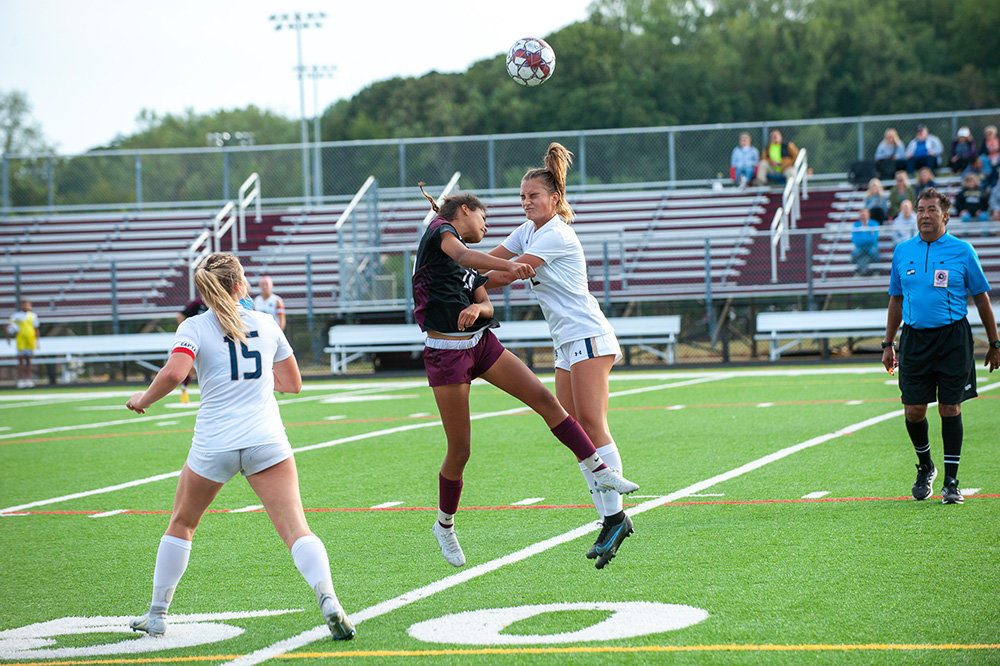 Nevaeh Dowell (left) and a Severna Park player fought for possession.