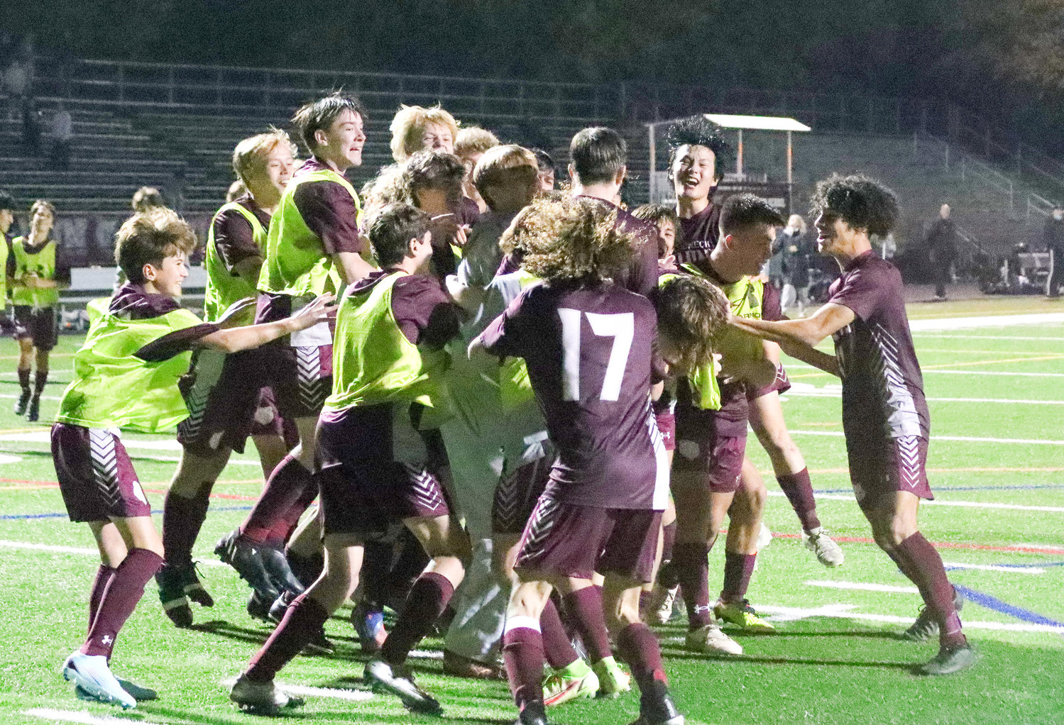 The Bruins celebrated after beating Annapolis 5-4 on October 26.