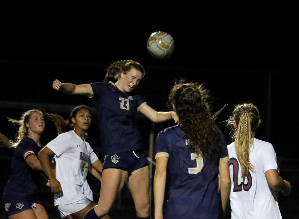 Ryn Feemster jumped in the air on this header.